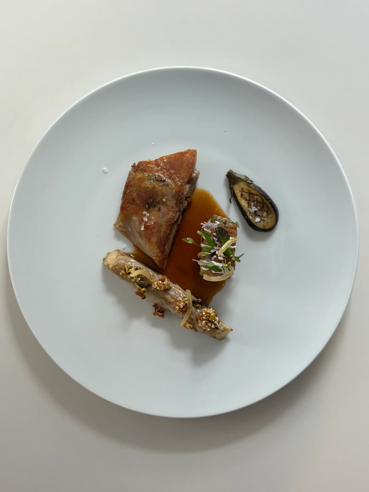 Milk-fed lamb shoulder / spiced granola / eggplant