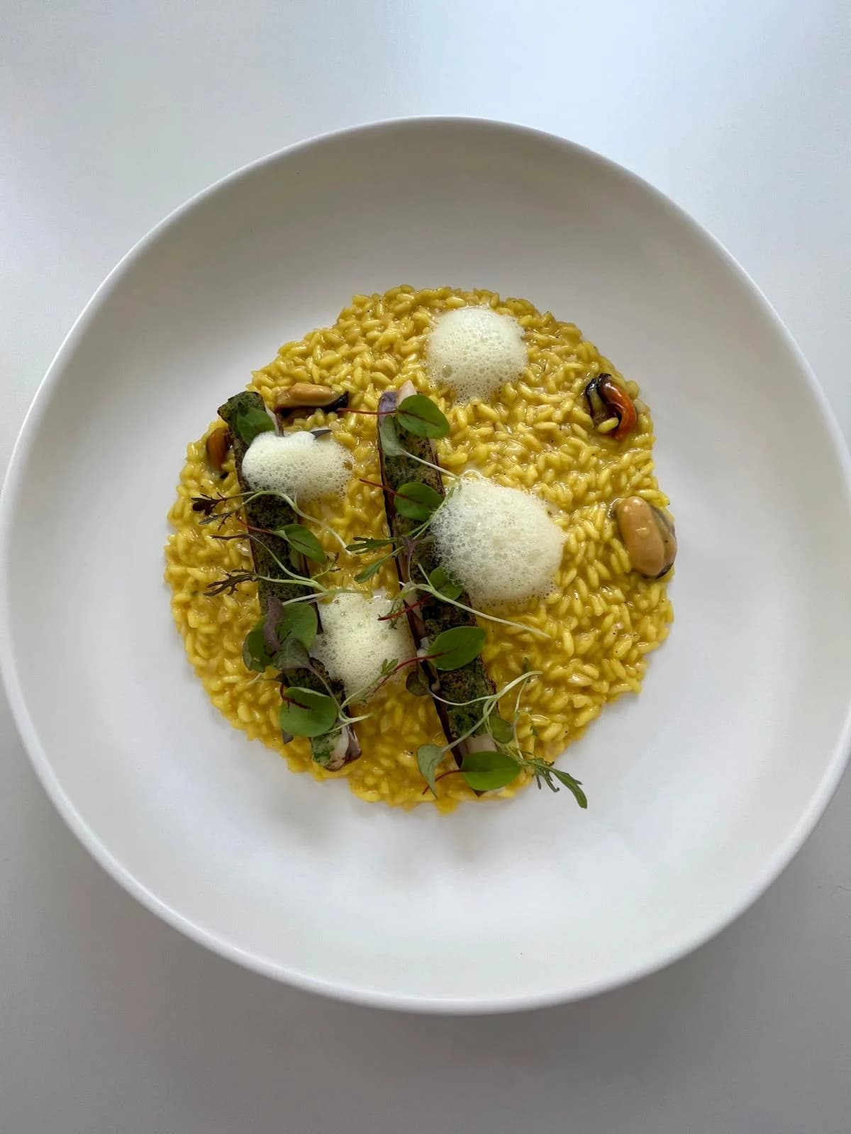 Saffron risotto / mussels / razor clam / zesty foam