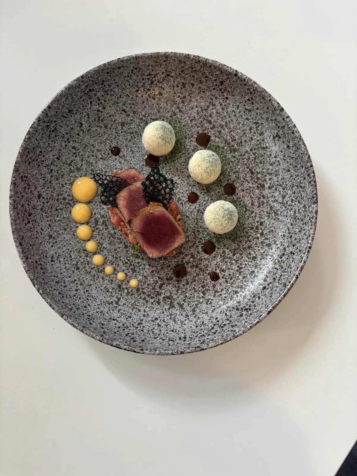 Tuna tartar / mustard ice cream / pickled egg yolk / tuile